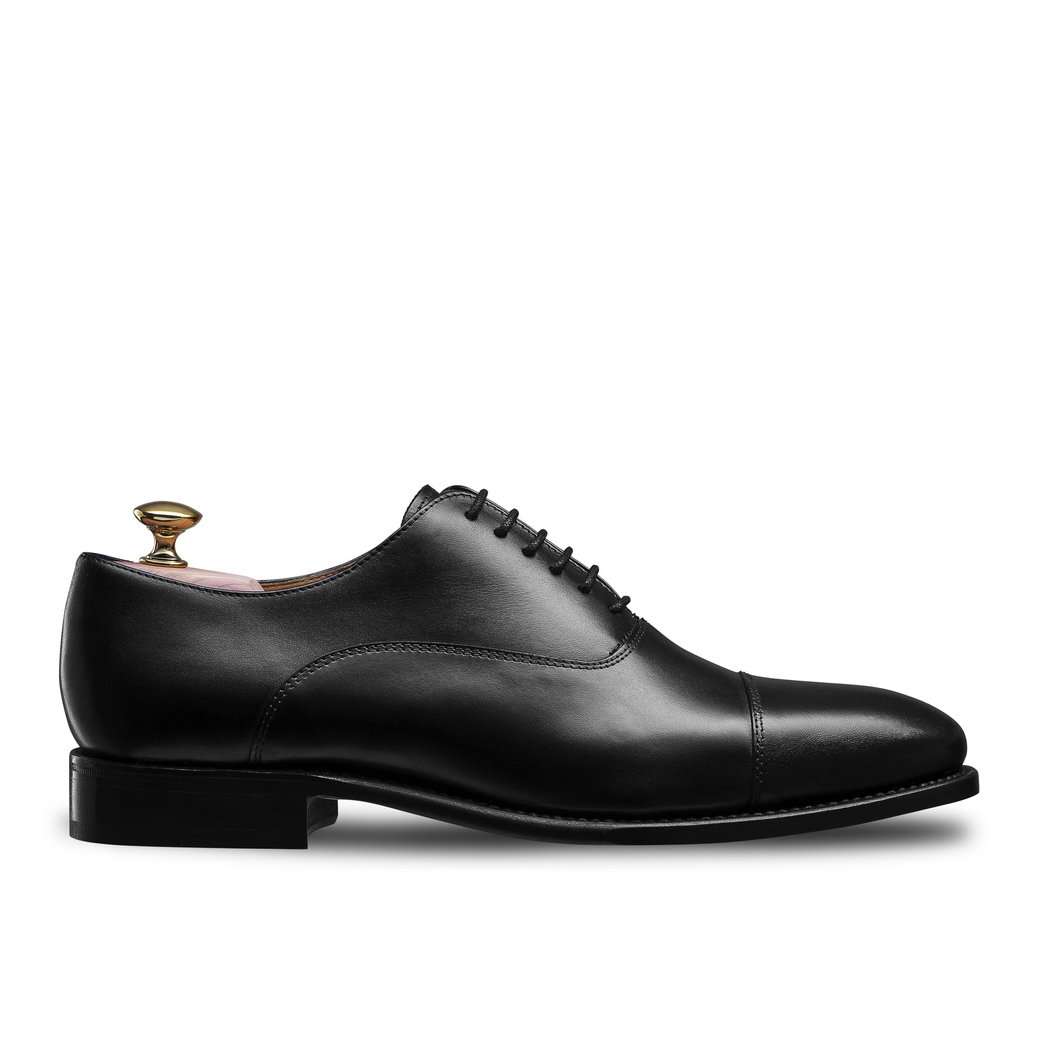 Black oxford with straight toe in barely grain calfskin and Goodyear stitching. LodinG